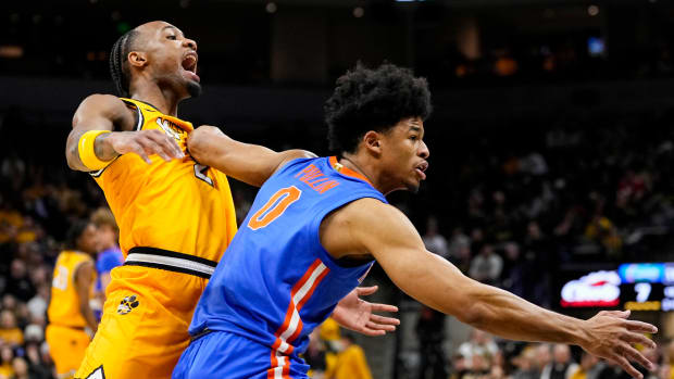 Florida Gators guard Zyon Pullin (0) awaits the inbound against Missouri Tigers guard Tamar Bates (2) during the first half at Mizzou Arena.